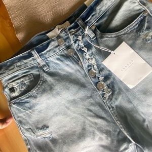 KanCan jeans.